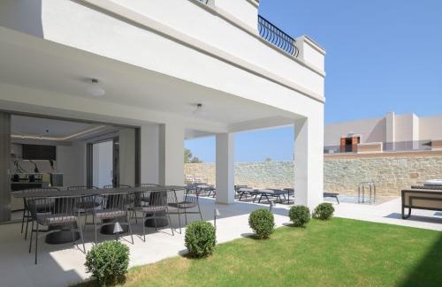 Perama Villa | Ivory Villa: Elegant Oceanfront Escape with Pool & Hot Tub