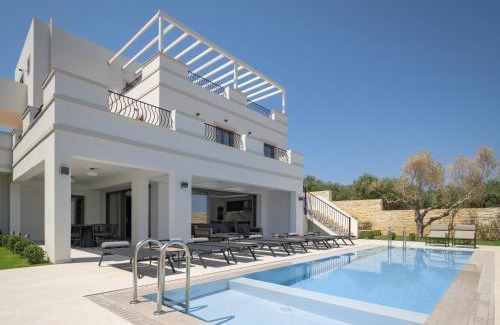 Perama Villa | Ivory Villa: Elegant Oceanfront Escape with Pool & Hot Tub