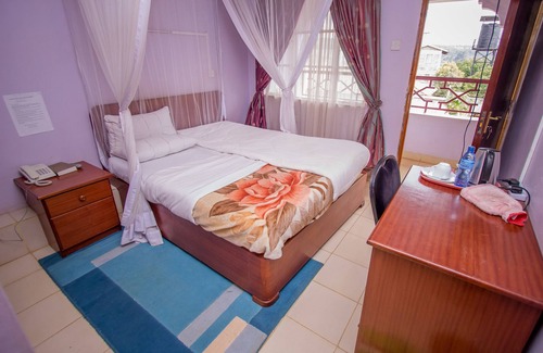 Kericho House | Discover Ivys Inn Guest House: Family-Friendly Retreat