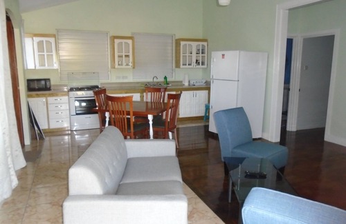 Mount Pleasant Bay House | Experience Ixora Garden Apartments with Oceanfront Views