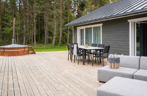 Hiiu House | Inviting Jõeranna Pond House with Hot Tub & Family Fun