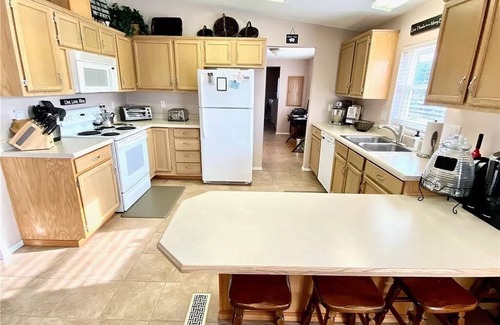 Desert Aire House | Experience J and M Retreat with Heated Pool & Family Amenities