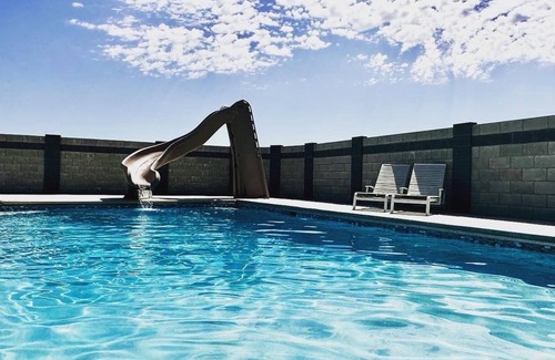 Desert Aire House | Experience J and M Retreat with Heated Pool & Family Amenities