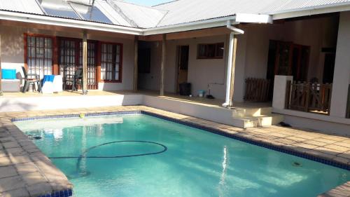 uMlalazi House | Budget-Friendly Jacaranda Guesthouse with Pool & Family Comfort