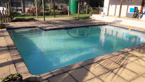 uMlalazi House | Budget-Friendly Jacaranda Guesthouse with Pool & Family Comfort