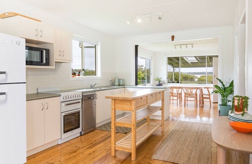 Culburra Beach House | Jack's Culburra: Waterfront Retreat with Cozy Fireplace