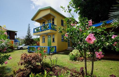 Calibishie Apartment | Discover Jacoway Inn: Oceanfront Retreat with Spa & Pets Welcome