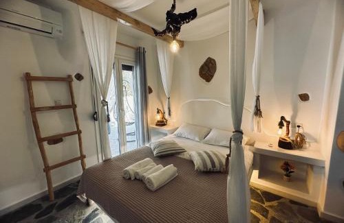 Glinado Apartment | Elegant Janakos Apartment: Family-Friendly with Hot Tub