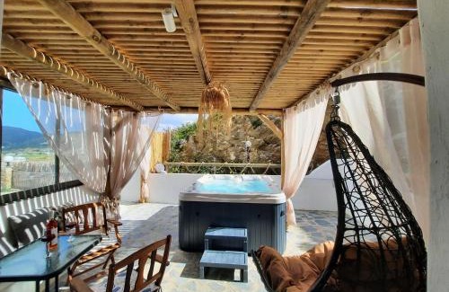 Glinado Apartment | Elegant Janakos Apartment: Family-Friendly with Hot Tub