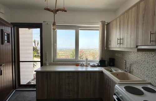 Glinado Apartment | Elegant Janakos Apartment: Family-Friendly with Hot Tub