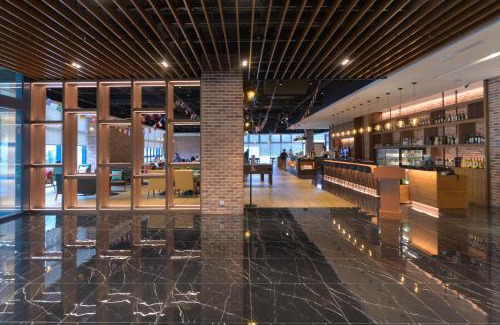 Wuqi District Hotel | Explore JANDA Golden Tulip Hotel: 4-Star Family Retreat