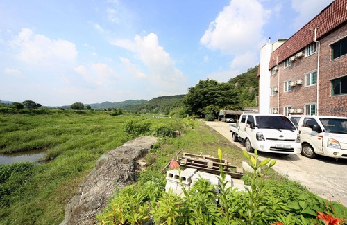 Jangseong Hotel | Eco-Friendly Jangseong Suseok Motel with Breakfast & Kitchen