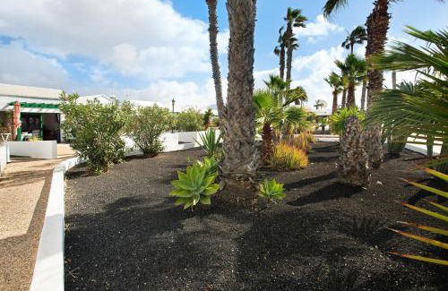 Playa Blanca Apartment | Guest Rated 10/10 at Jardin del Sol 22 with Pool Access