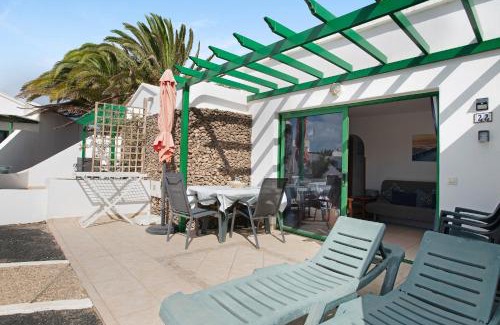 Playa Blanca Apartment | Guest Rated 10/10 at Jardin del Sol 22 with Pool Access