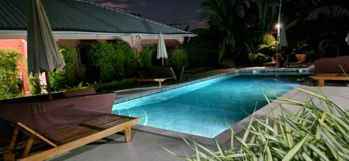 Nosy Be Apartment | Discover Jardin Fleuri de Lety with Oceanfront Pool & Dining