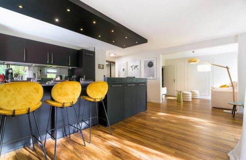 Faubourg Sud Apartment | Elegant Jardin Wilson: 4-Star Family-Friendly Retreat