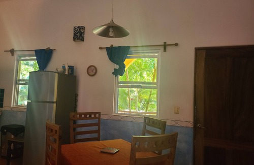 La Manzanilla Apartment | Cozy Jardines Tropicales: Steps from the Beach with Ocean Views