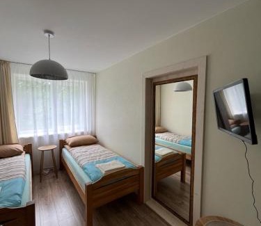 Sniuraiciai Apartment | Cozy Apartment Rental in Šiauliai With Family-Friendly Touch