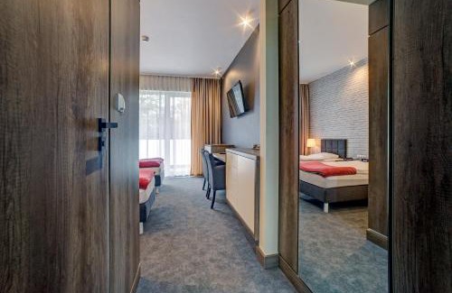 Radruz Apartment | Comfortable Stay at JAWOR with On-Site Restaurant