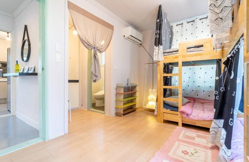 Jungmun House | Family-Friendly Jeju Dalbam Pension with Kitchen Amenities