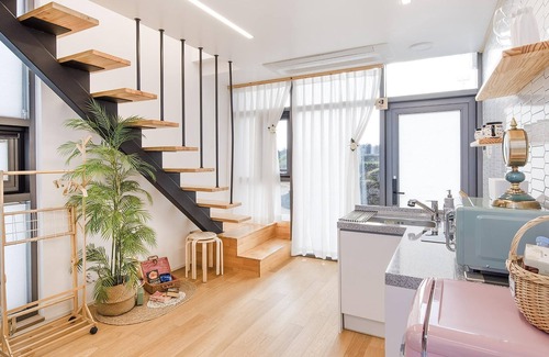 Pyeongdae-ri House | Elegant Jeju Geunalohu Pension with Pool & Family Amenities