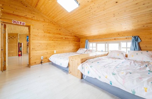 Andeok House | Family-Friendly Retreat at Jeju Jejue Meomulda with Pool
