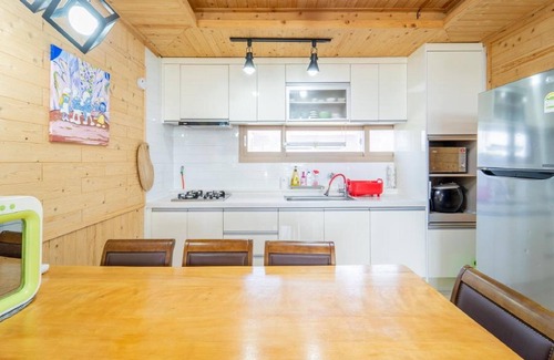 Andeok House | Family-Friendly Retreat at Jeju Jejue Meomulda with Pool