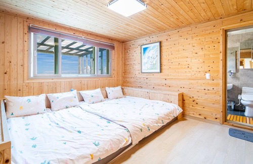Andeok House | Family-Friendly Retreat at Jeju Jejue Meomulda with Pool