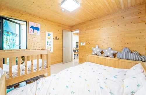 Andeok House | Family-Friendly Retreat at Jeju Jejue Meomulda with Pool