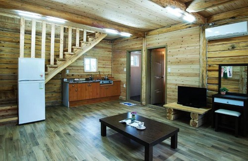 Pyoseon House | Family-Friendly Jeju Joa Log Pension with Ocean Views