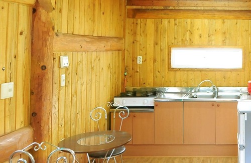Pyoseon Condo | Inviting Getaway at Jeju Log Pension with Family-Friendly Perks