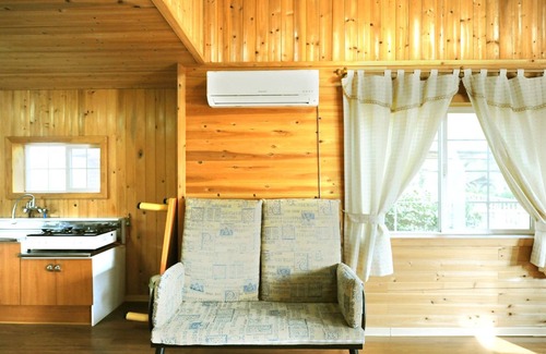 Pyoseon Condo | Inviting Getaway at Jeju Log Pension with Family-Friendly Perks