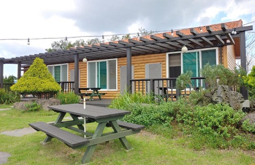 Hallim House | Discover Jeju Oreum Pension with Family-Friendly Comfort