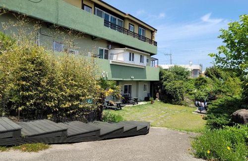 Hallim House | Discover Jeju Oreum Pension with Family-Friendly Comfort