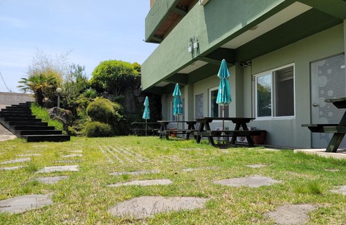 Hallim House | Discover Jeju Oreum Pension with Family-Friendly Comfort