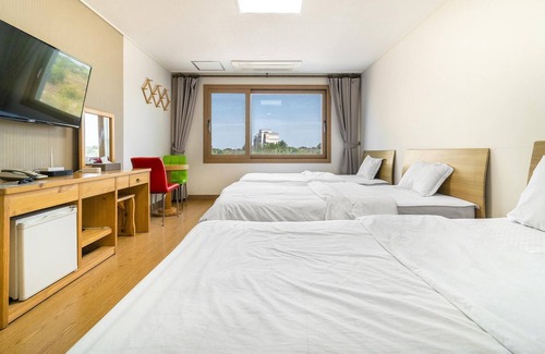 Downtown House | Cozy Jeju Samda Hostel: Family-Friendly with Kitchen Access