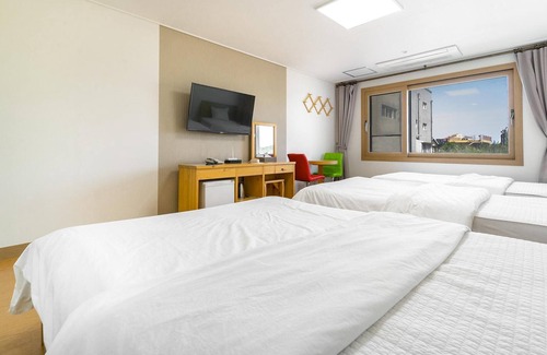 Downtown House | Cozy Jeju Samda Hostel: Family-Friendly with Kitchen Access