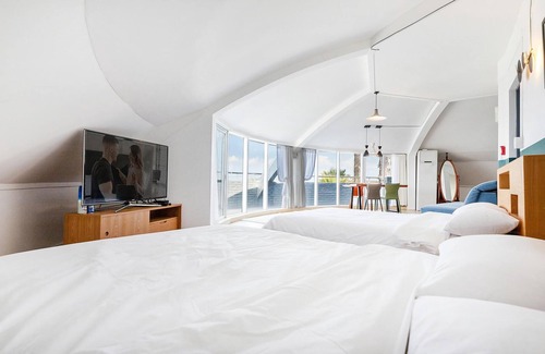 Aewol House | Explore Jeju UFO Pension: Family-Friendly Stay with Kitchen