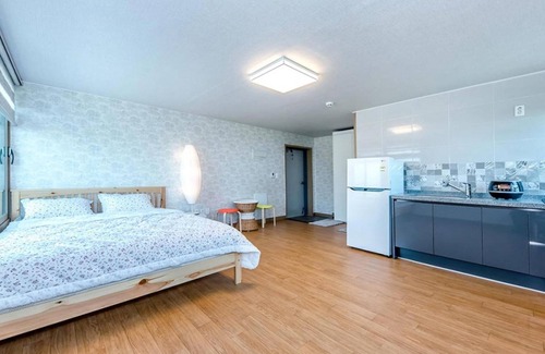 Gujwa House | Discover Jeju Woljeongripungcha Pension with Family Amenities