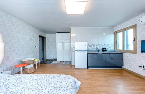 Gujwa House | Discover Jeju Woljeongripungcha Pension with Family Amenities