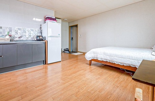 Gujwa House | Discover Jeju Woljeongripungcha Pension with Family Amenities