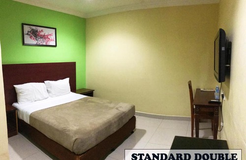 Kampung Pedah Hotel | Budget-Friendly Jerantut Hill Inn: Child-Friendly Retreat