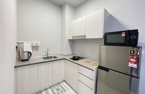 Downtown Kota Kinabalu Apartment | Inviting Jesselton Quay Apartment with Mountain Views