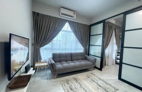 Downtown Kota Kinabalu Apartment | Inviting Jesselton Quay Apartment with Mountain Views