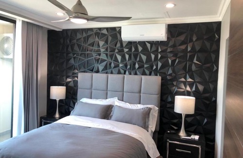 Tegucigalpa Apartment | Experience JF Apartments: Oceanfront Oasis with Spa & Pool