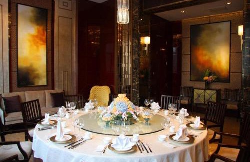 Dongdan Hotel | Indulge at Jianguo Garden Hotel: 5-Star Retreat with Spa & Pool