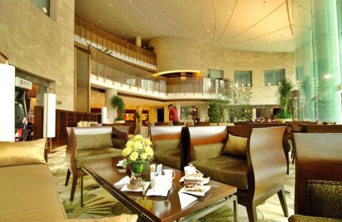 Dongdan Hotel | Indulge at Jianguo Garden Hotel: 5-Star Retreat with Spa & Pool