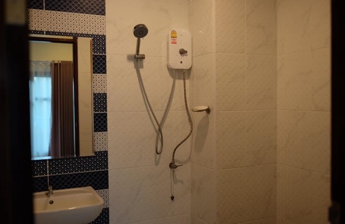 Thani Hotel | Discover Jitra Resort: Family-Friendly with Great Amenities