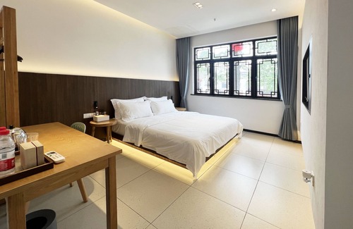 Changshu Bed & Breakfast | Explore Jiu Shu Feng Wu Mei Shu Guan Hotel with Breakfast