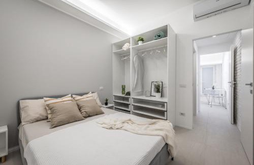 Turro Apartment | Chic JJ6 Loreto-Duomo: Pet & Child Friendly Stay